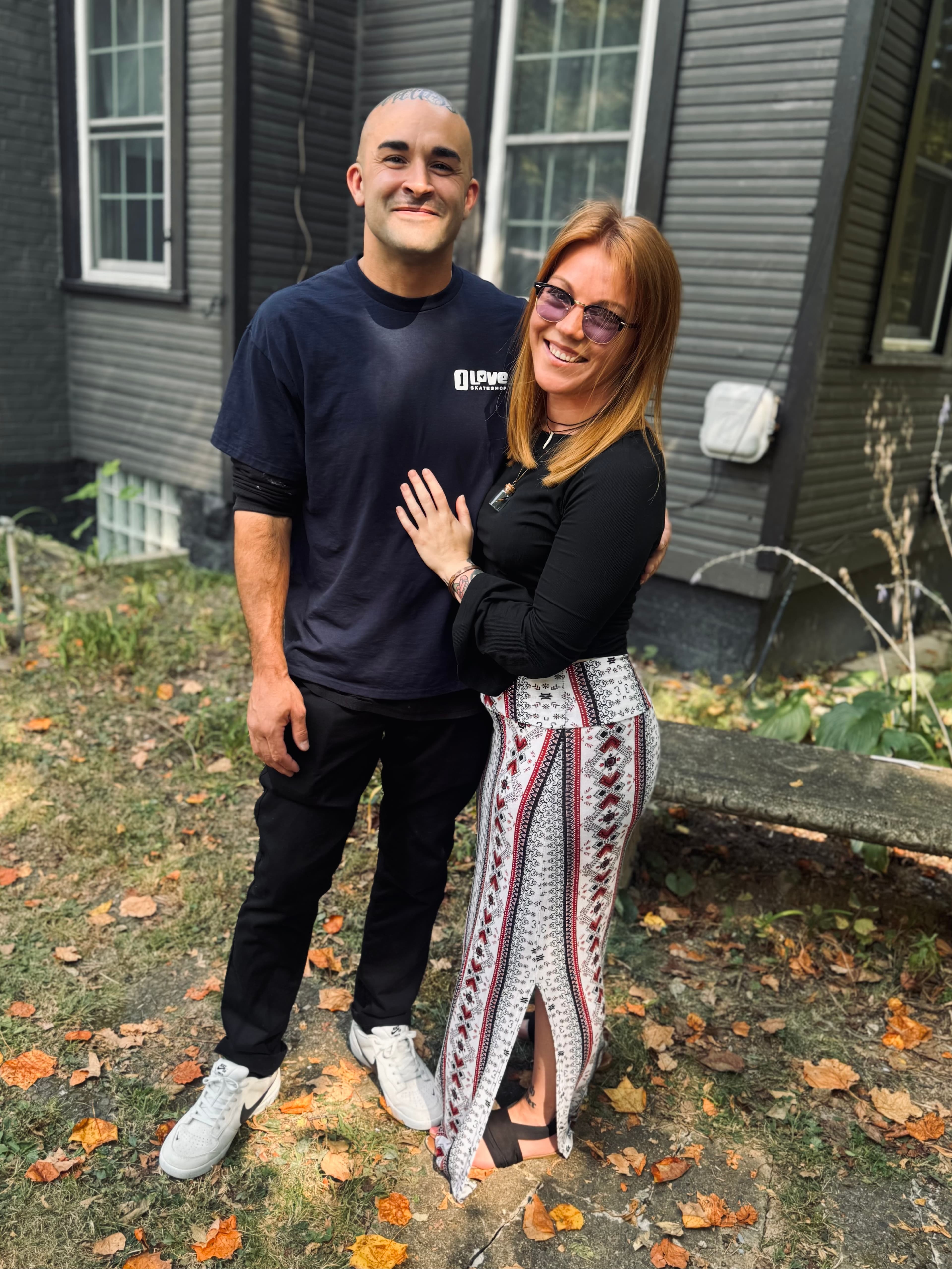 Jenna Gray and her partner outside a Dayton-area home