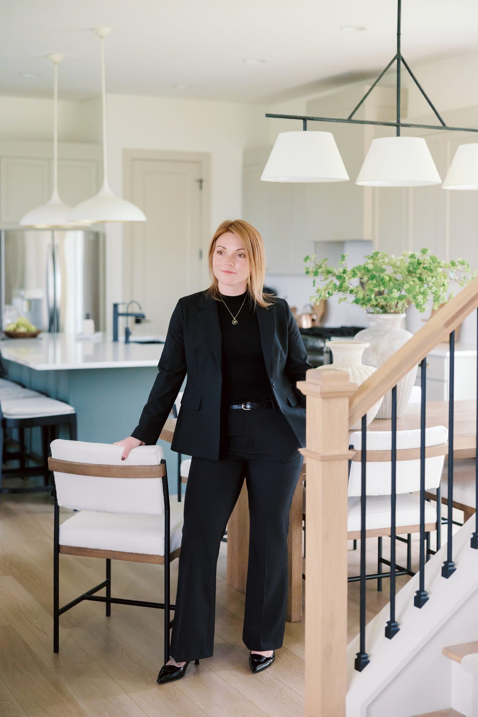 Jenna Gray, Dayton realtor, standing in the kitchen of a renovated home